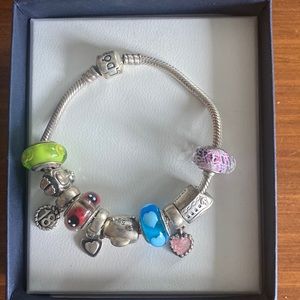Authentic Pandora bracelet for sale ⚫️⚫️ willing to negotiate!